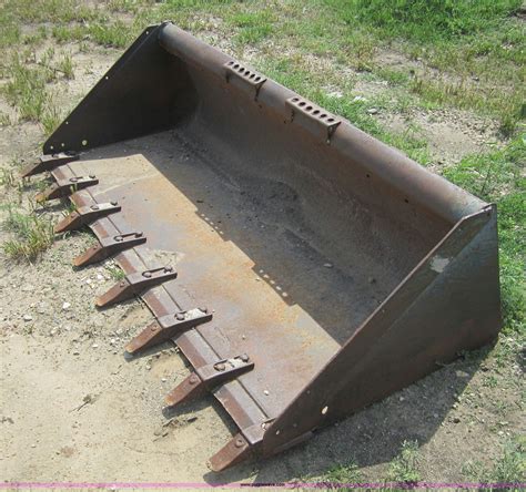 used bobcat skid steer bucket|used bobcat bucket with teeth.